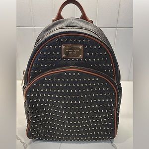 Michael Kors brown leather backpack with gold studs and adjustable straps!